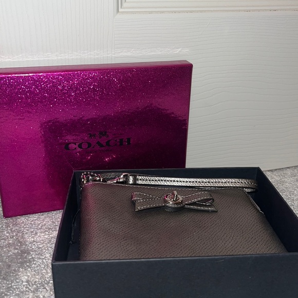 Silver Leather Wristlet with Silver Bow Detail, Two Card Pockets Inside - Picture 2 of 9